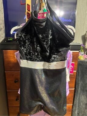 3 Justice 2pc sets! BNWT! 1 Black Glitter set Lrg. & 2 purple sets med. & Lrg.